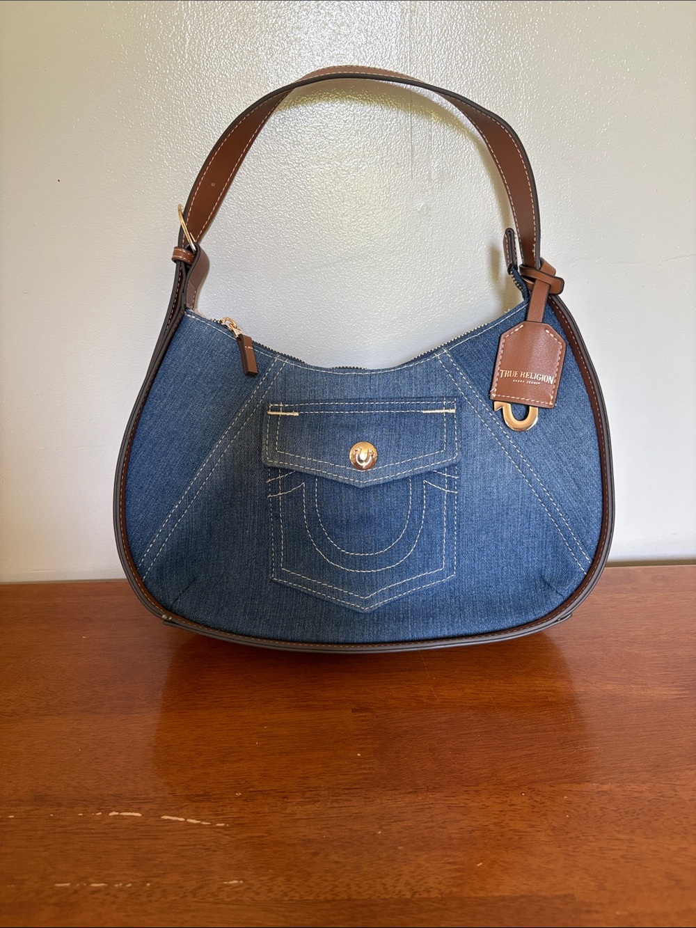 True Religion Denim Crescent Shoulder Bag in Blue with Brown Trim